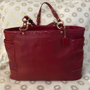 Large Coach tote. Dark-ish red and gold hardware. 16x11” perfect condition.